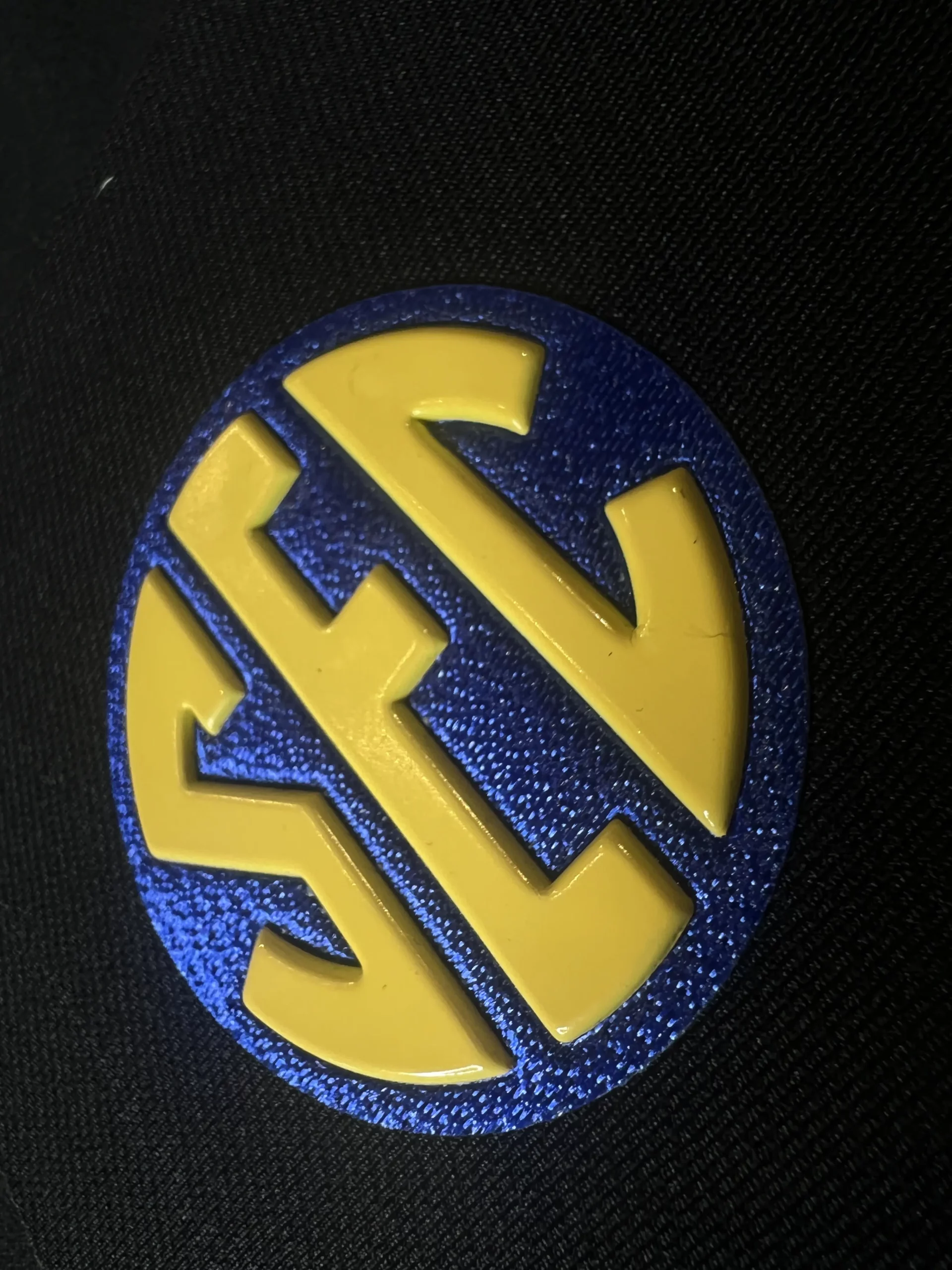 Custom rubber patch with SEC logo