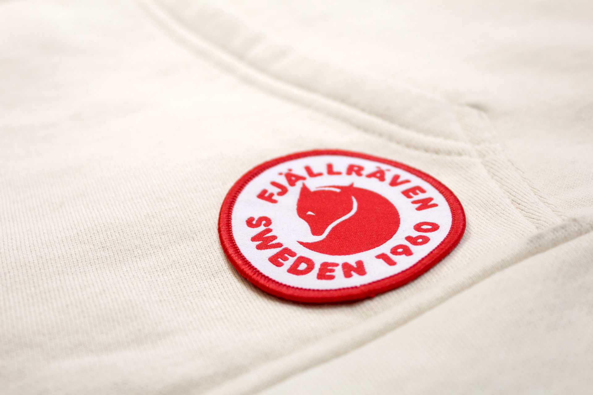 red embroidered Fjallraven patch