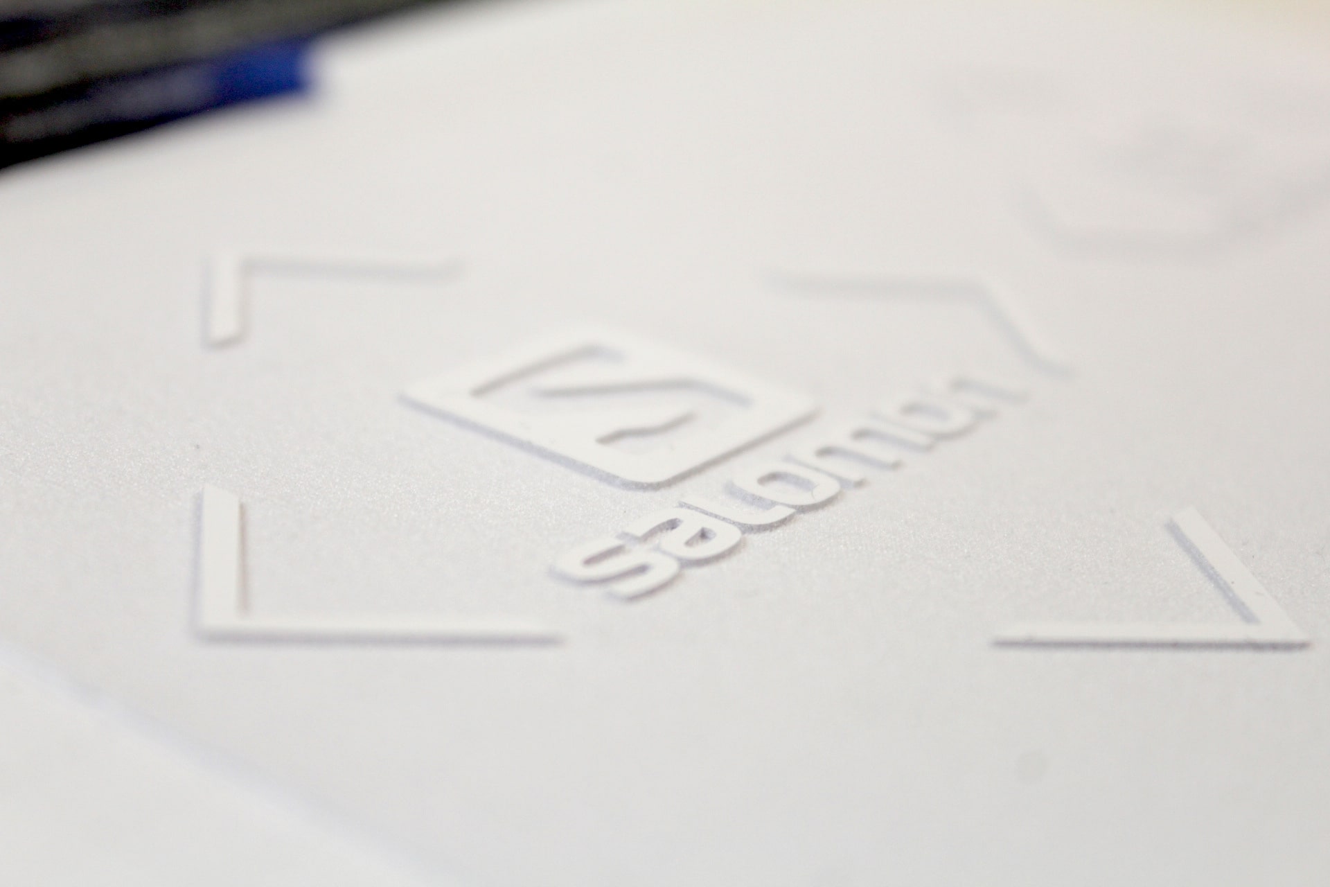 tonal white high-density logo on a white shirt