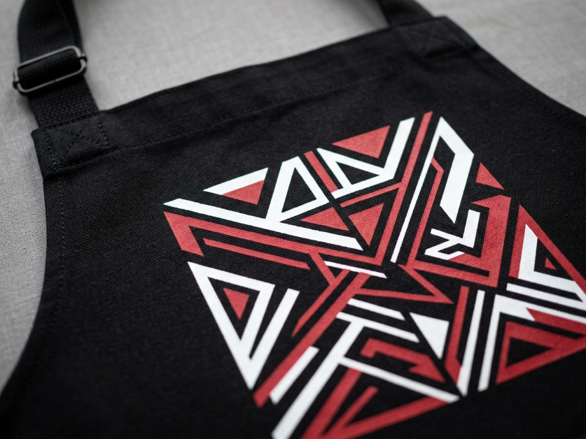 Screen-printed apron showing bold ink on cotton twill