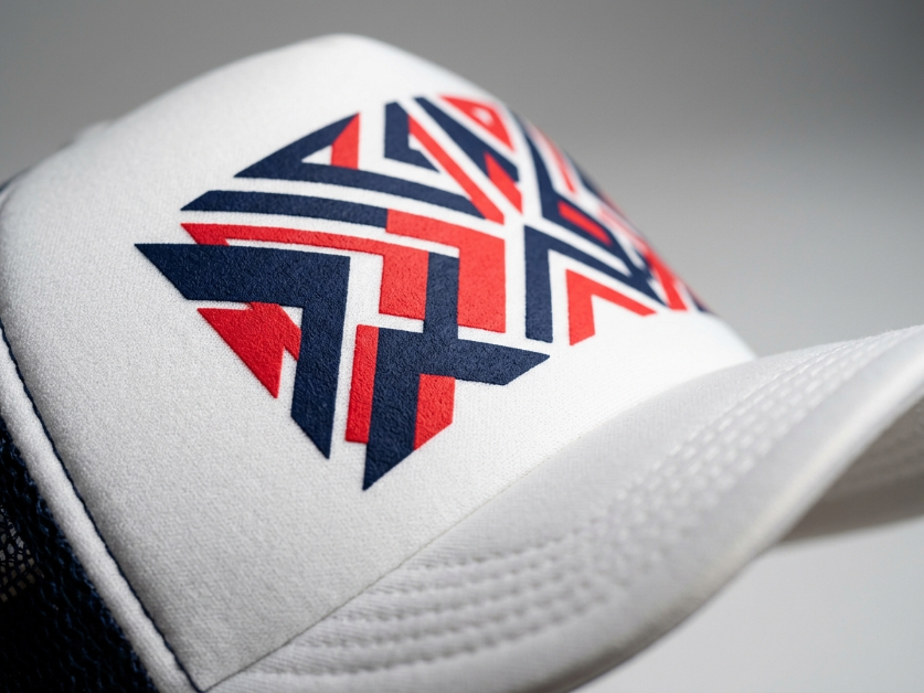 Custom screen-printed visor showing vibrant ink on foam front panel