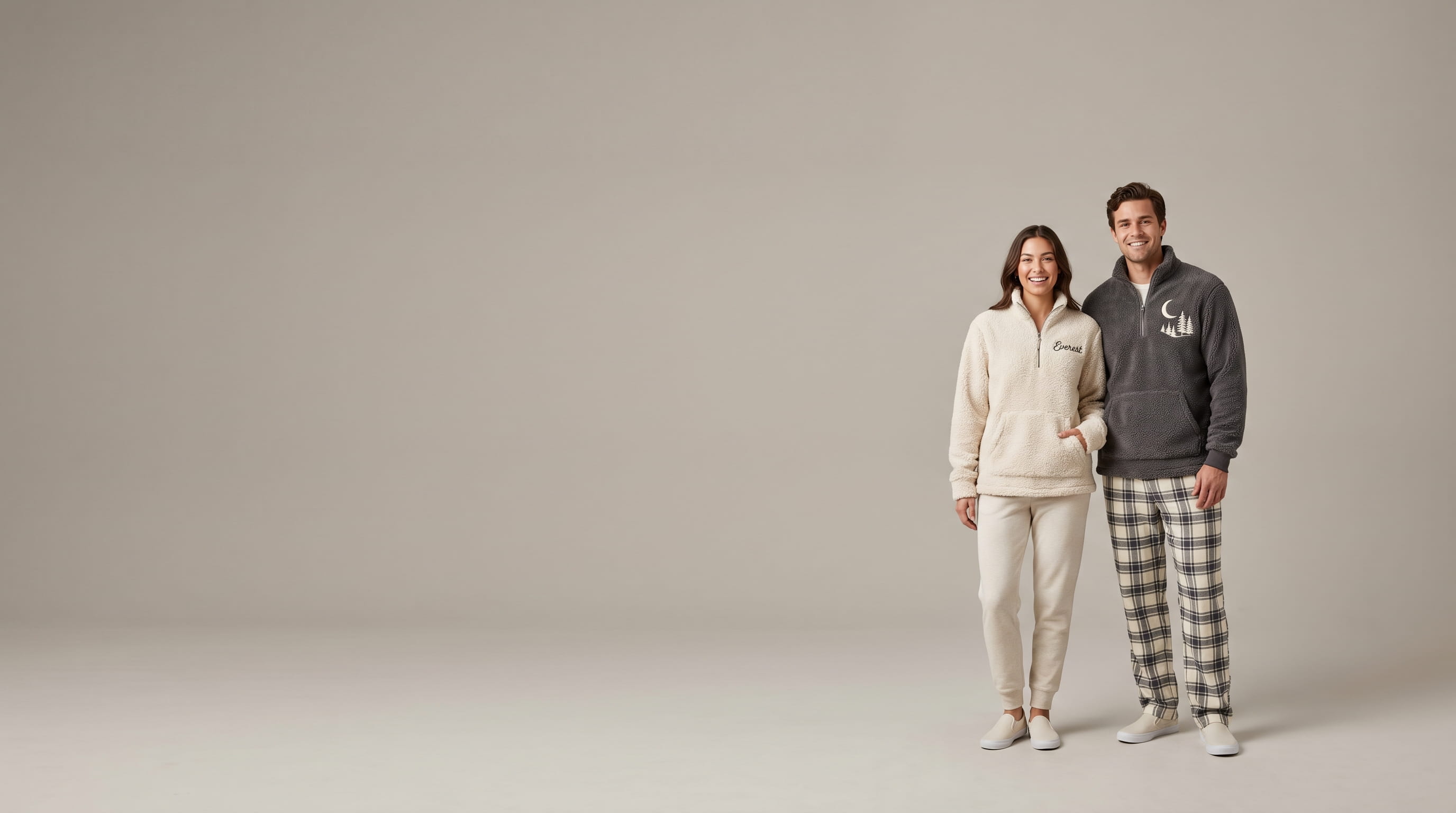 Two models with decorated Boxercraft loungewear and cozy fleece in a clean studio