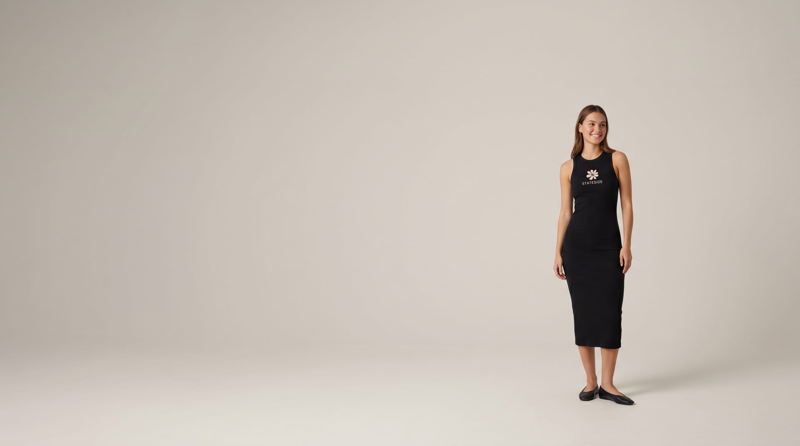 Woman wearing a decorated black baby-rib custom midi dress