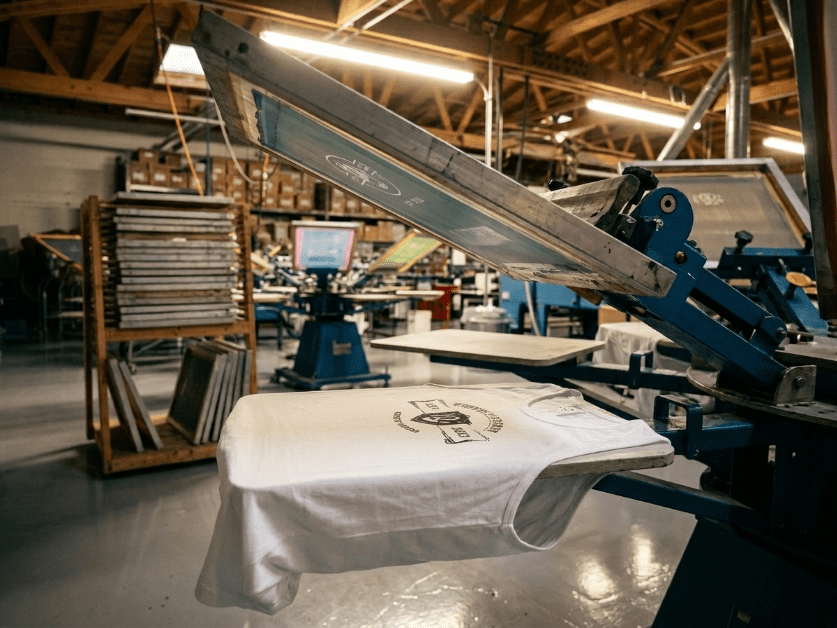 Screen-printed tank top showing bold ink on cotton jersey