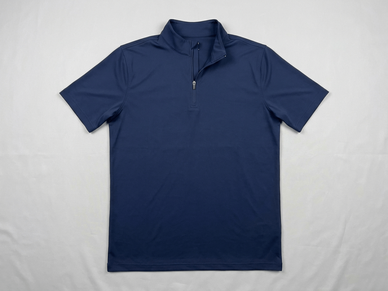 Quarter-zip polo anatomy - collar, left chest, sleeve, fit, hem