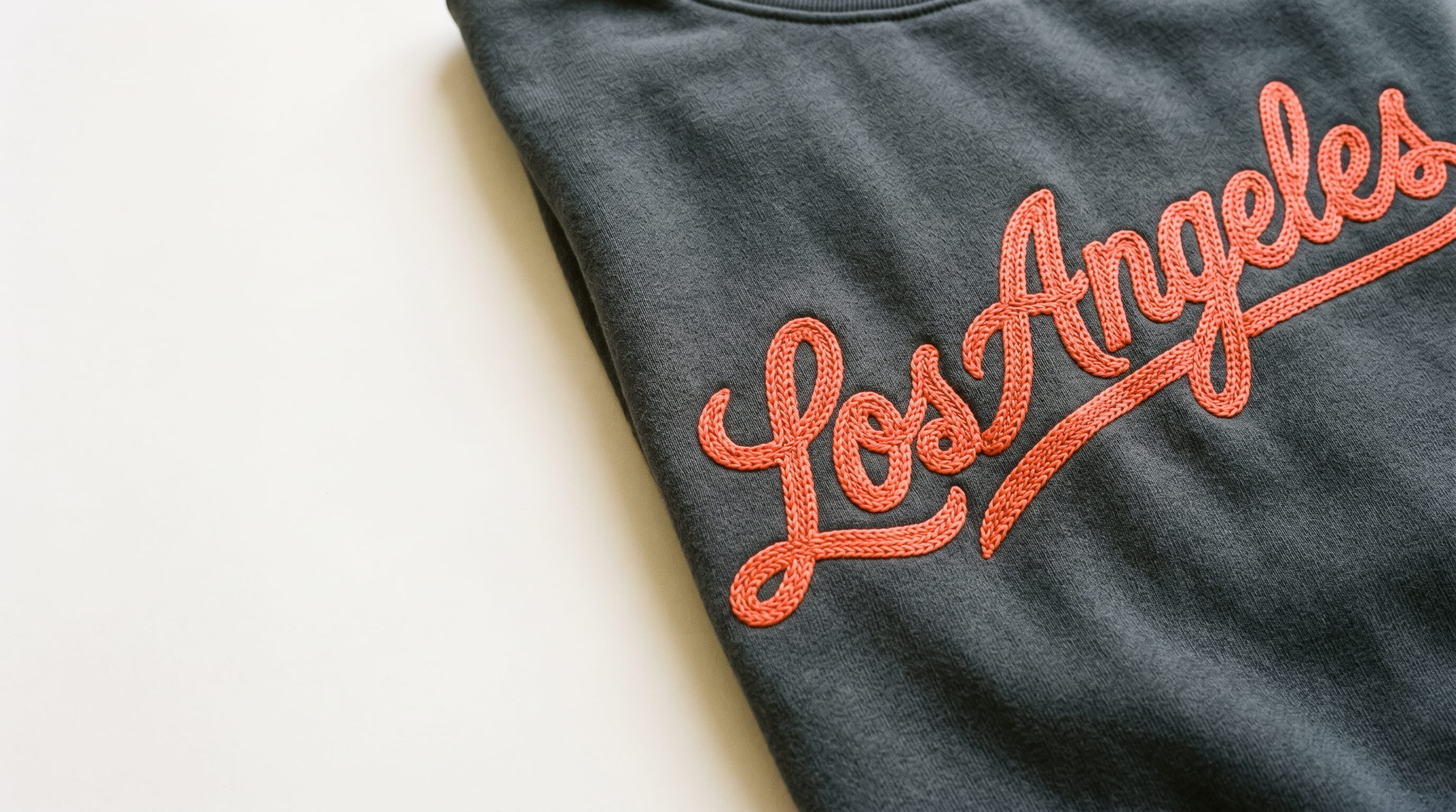 Looped vintage chain stitch embroidery on denim