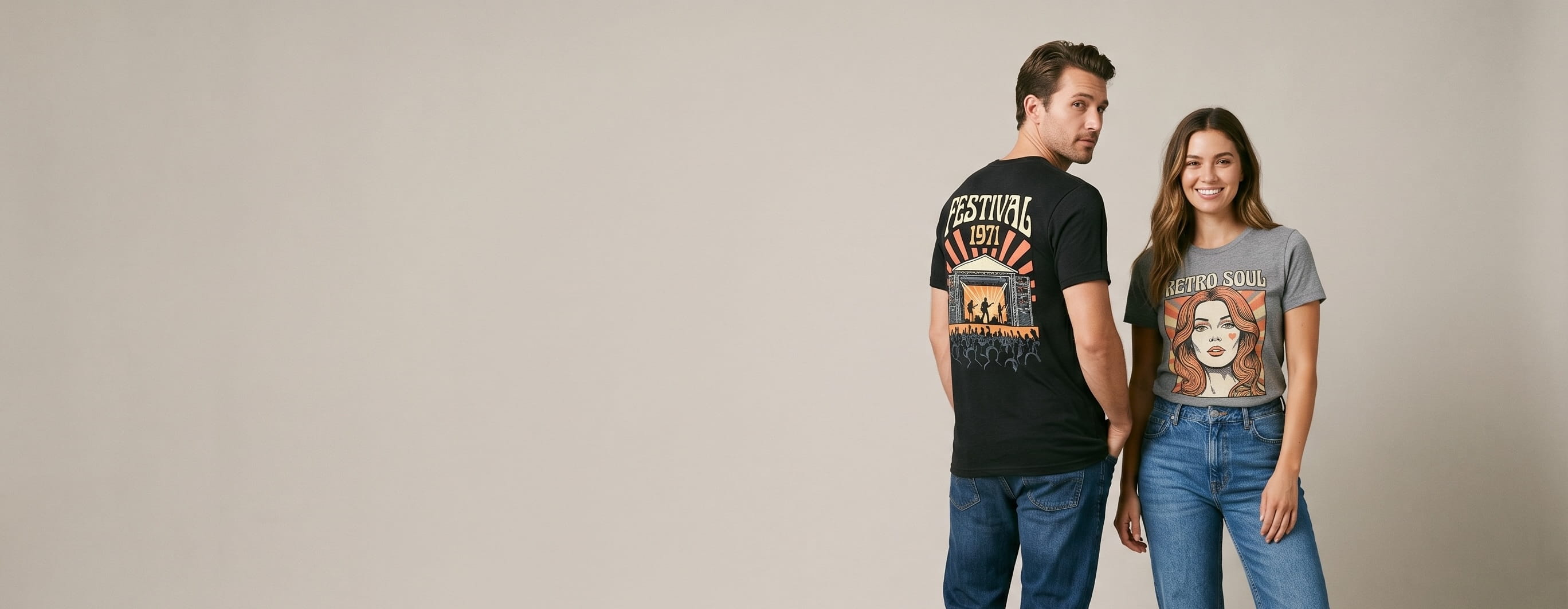Two festival-lifestyle models wearing decorated Next Level pieces — a large full-back retro festival-poster plastisol screen print on the man's vintage-black tri-blend tee, with the woman facing front in a heather-grey premium CVC crew showing a vintage retro portrait full-color DTG graphic
