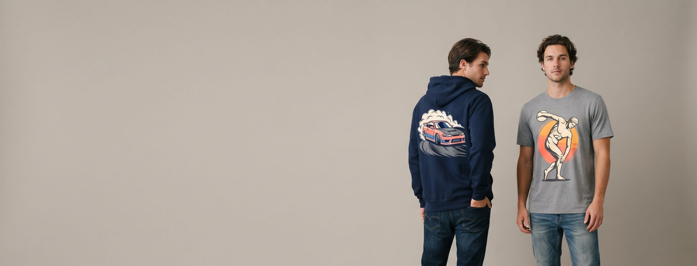 Two streetwear lifestyle models wearing decorated Port & Company — a full-back JDM tuner-coupe drift plastisol screen print on the first man's navy Fan Favorite fleece hoodie and a classical discus-thrower statue full-color DTG on the second man's athletic-heather Performance tee