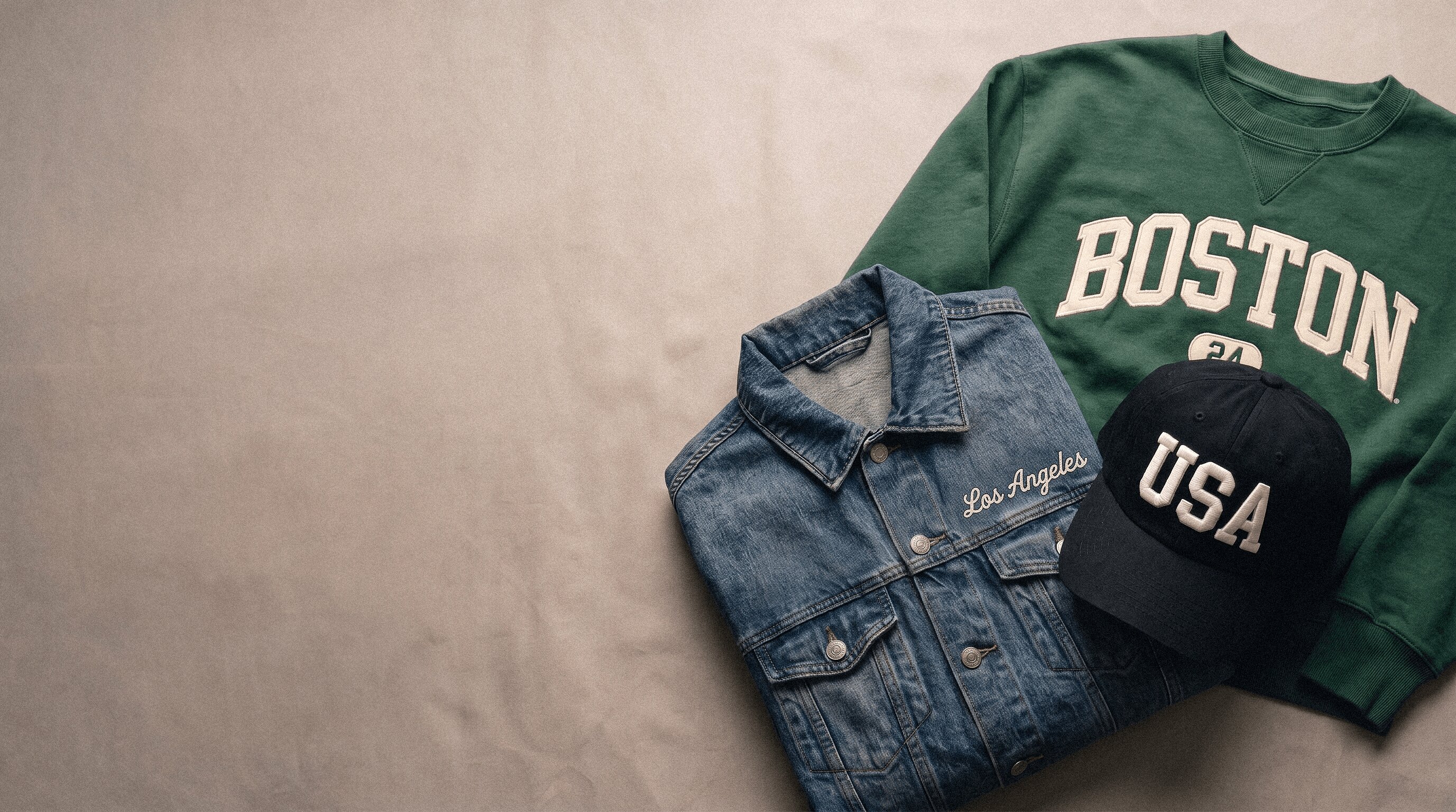 Custom-embroidered apparel — flat, 3D puff and chain stitch