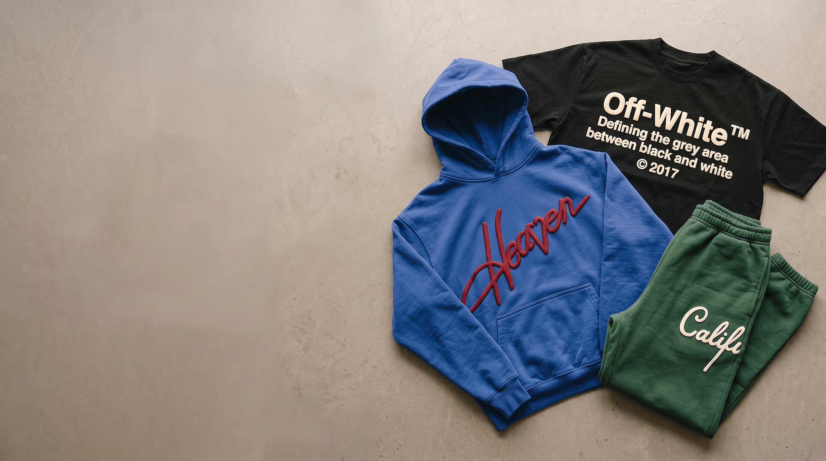 Bold raised 3D puff screen print on a t-shirt, hoodie, and sweatpants