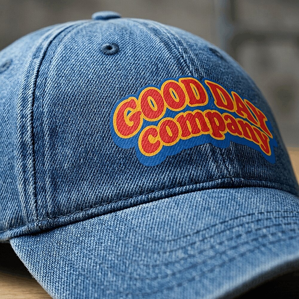 Water-based transfer on a cotton twill dad hat front panel