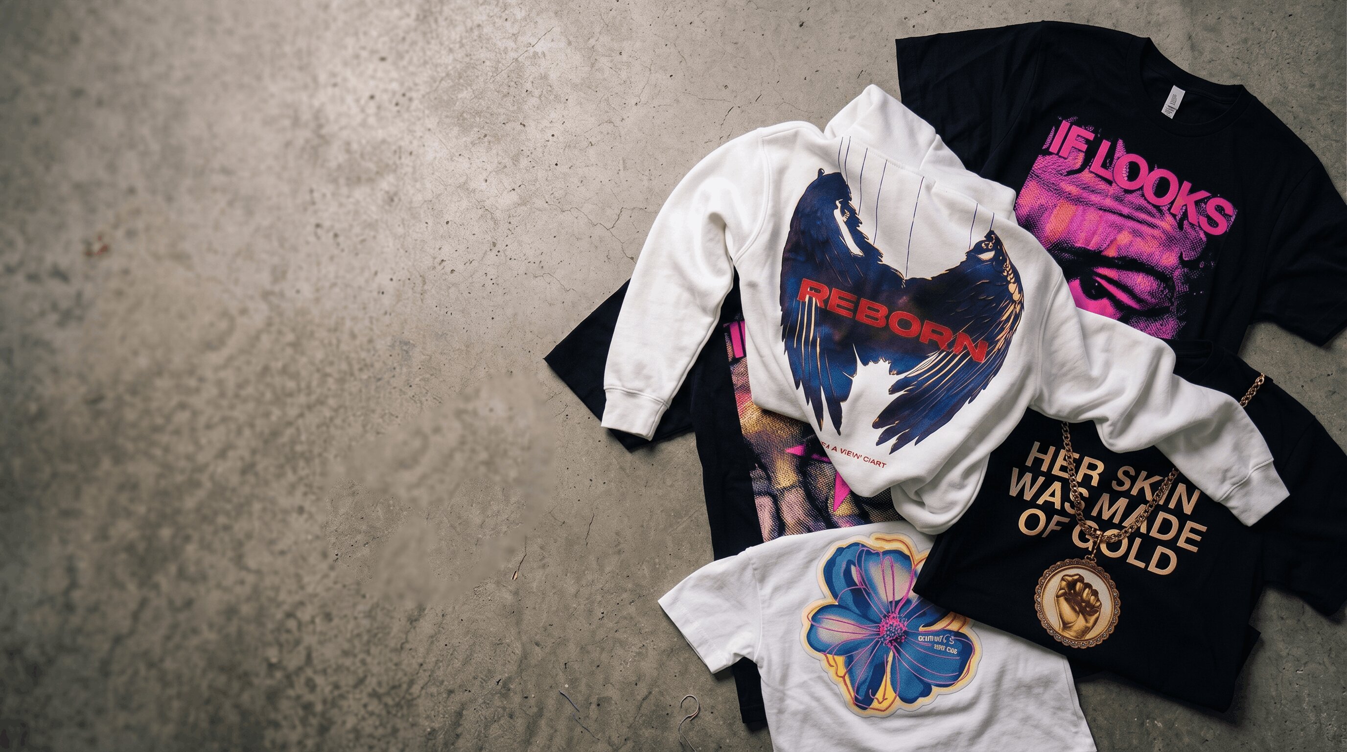Photo-real full-color water-based transfer prints on a cotton tee, a polyester hoodie, and a tote bag