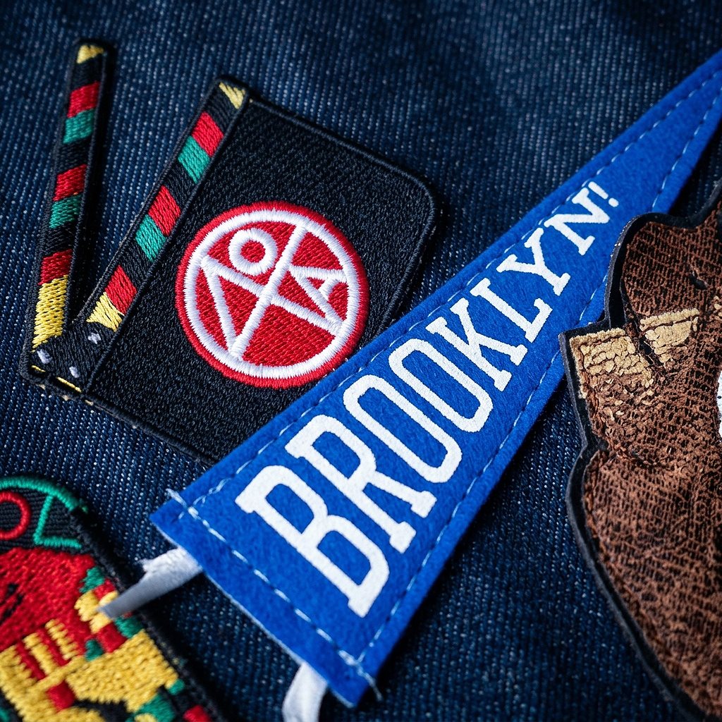 custom embroidered patches and a Brooklyn pennant patch on a jacket